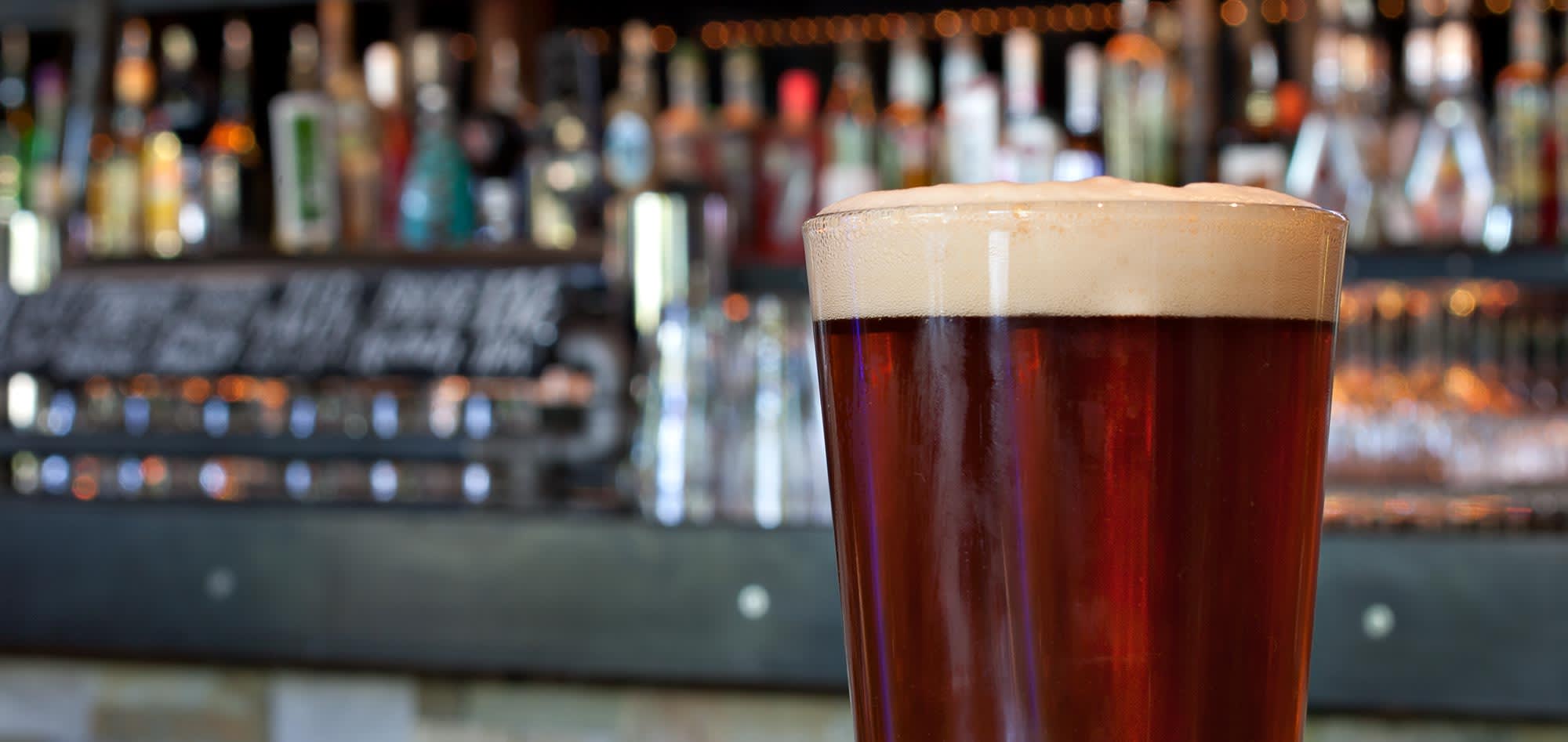 On-site bar featuring craft beer selection and full liquor spirits