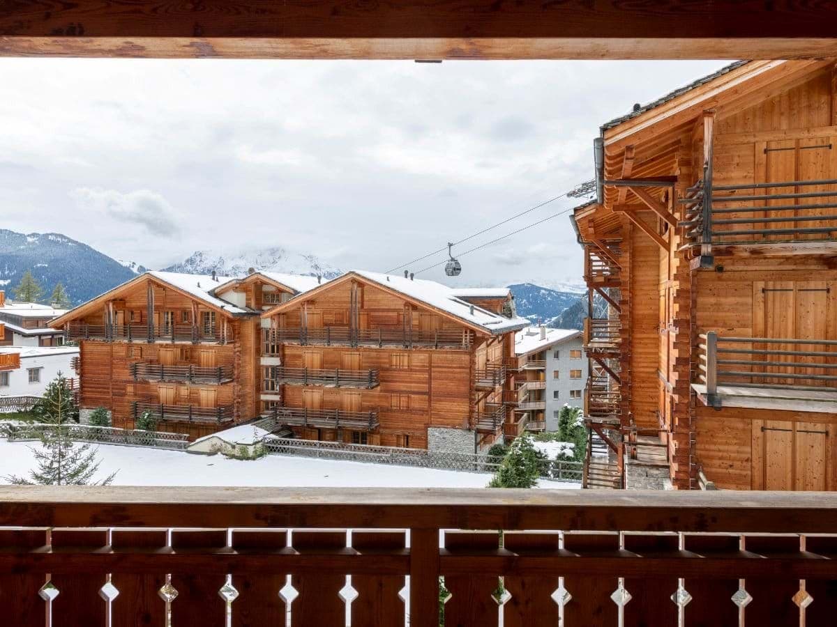 Private balcony with mountain views and proximity to ski gondola