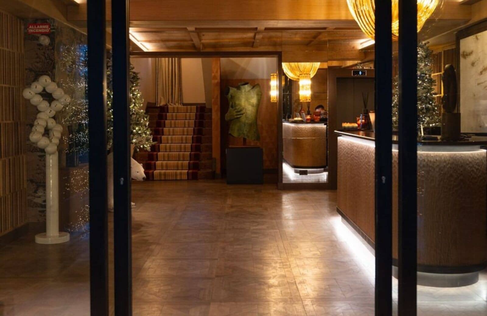 Building lobby with 24-hour reception desk and elevator access