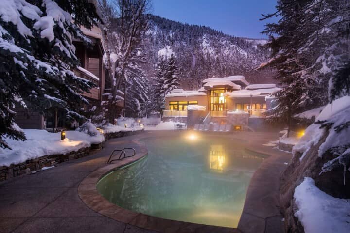 Heated outdoor pool and patio with mountain views