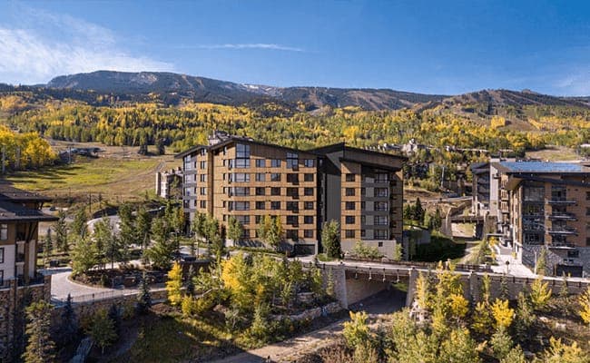 Ski-in/ski-out lodge exterior with direct access to mountain trails