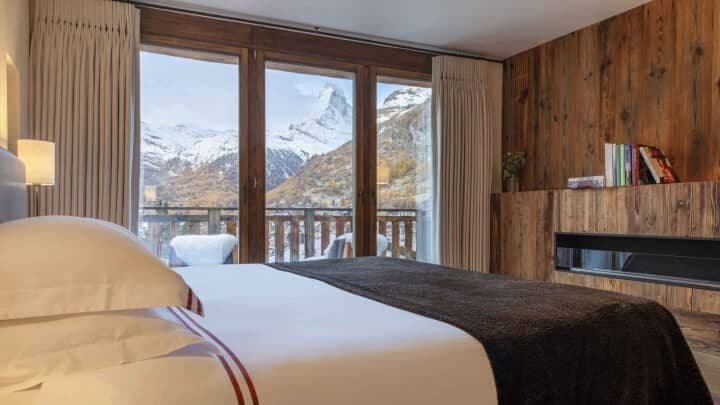 Primary bedroom with Matterhorn views and built-in electric fireplace