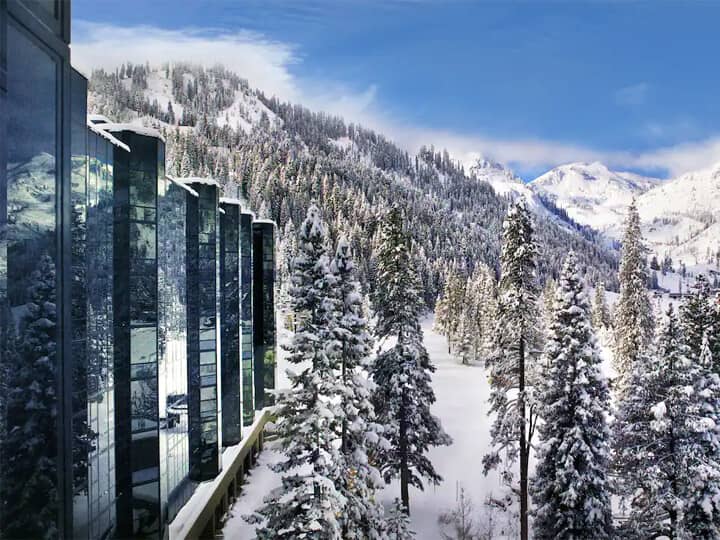Ski-in, ski-out access with mountain views and pine forest surroundings