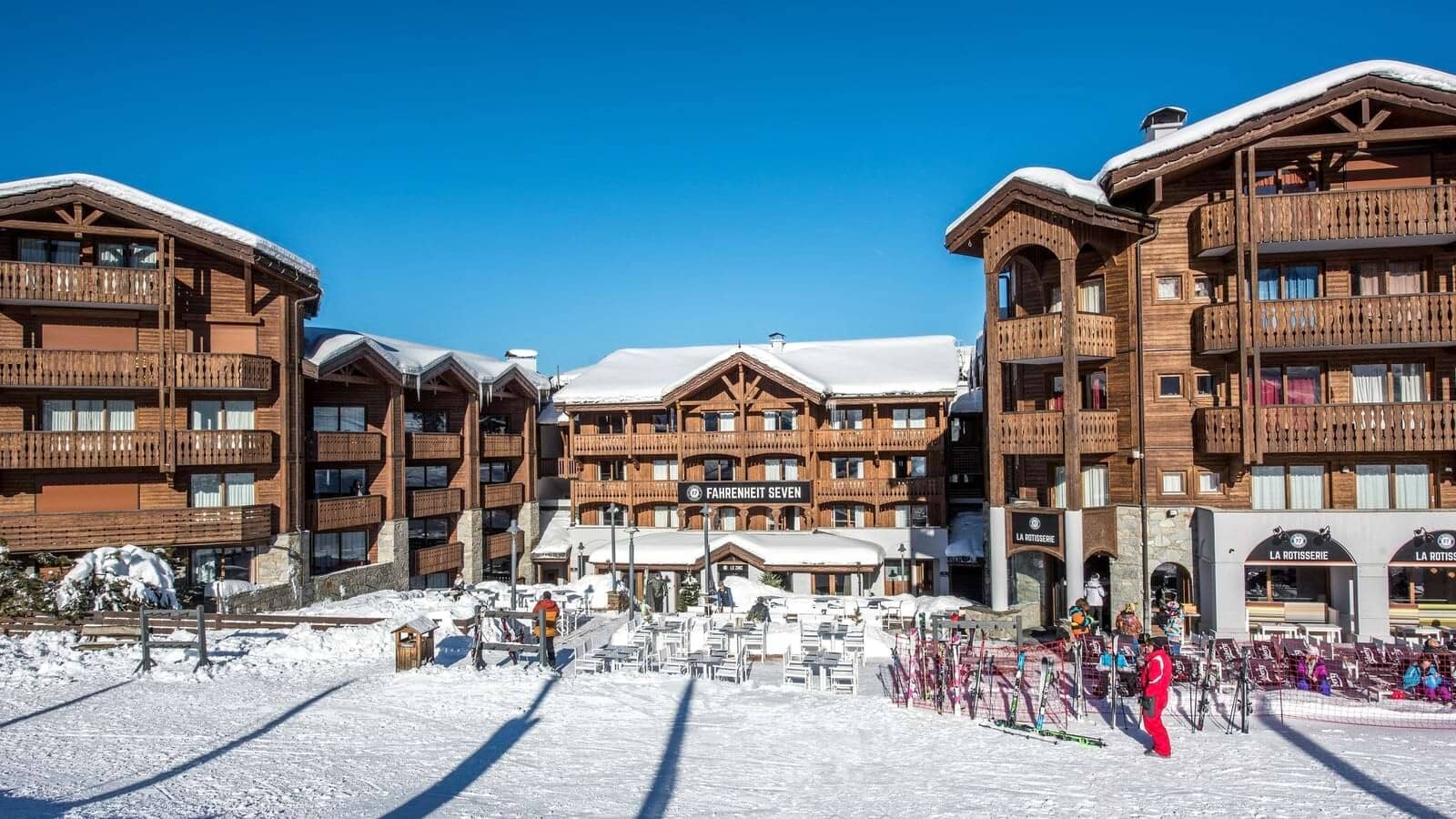Ski-in/ski-out chalet exterior with sun terrace and equipment racks