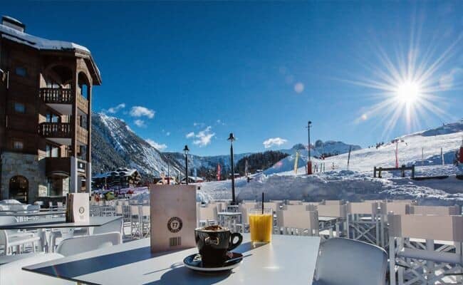 Ski-in/ski-out patio with mountain views and table service