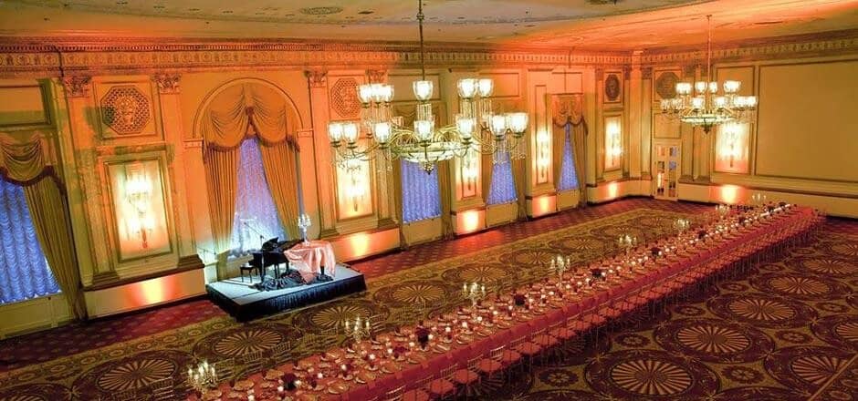 Grand ballroom with banquet seating for 50 and raised piano stage