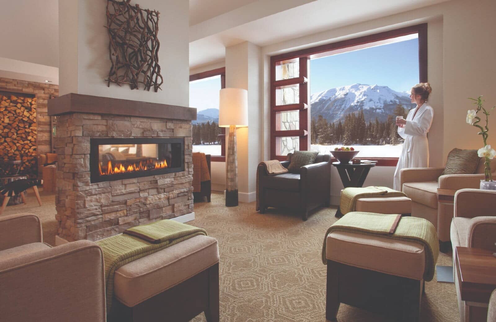 Lounge area with gas fireplace and mountain peak views