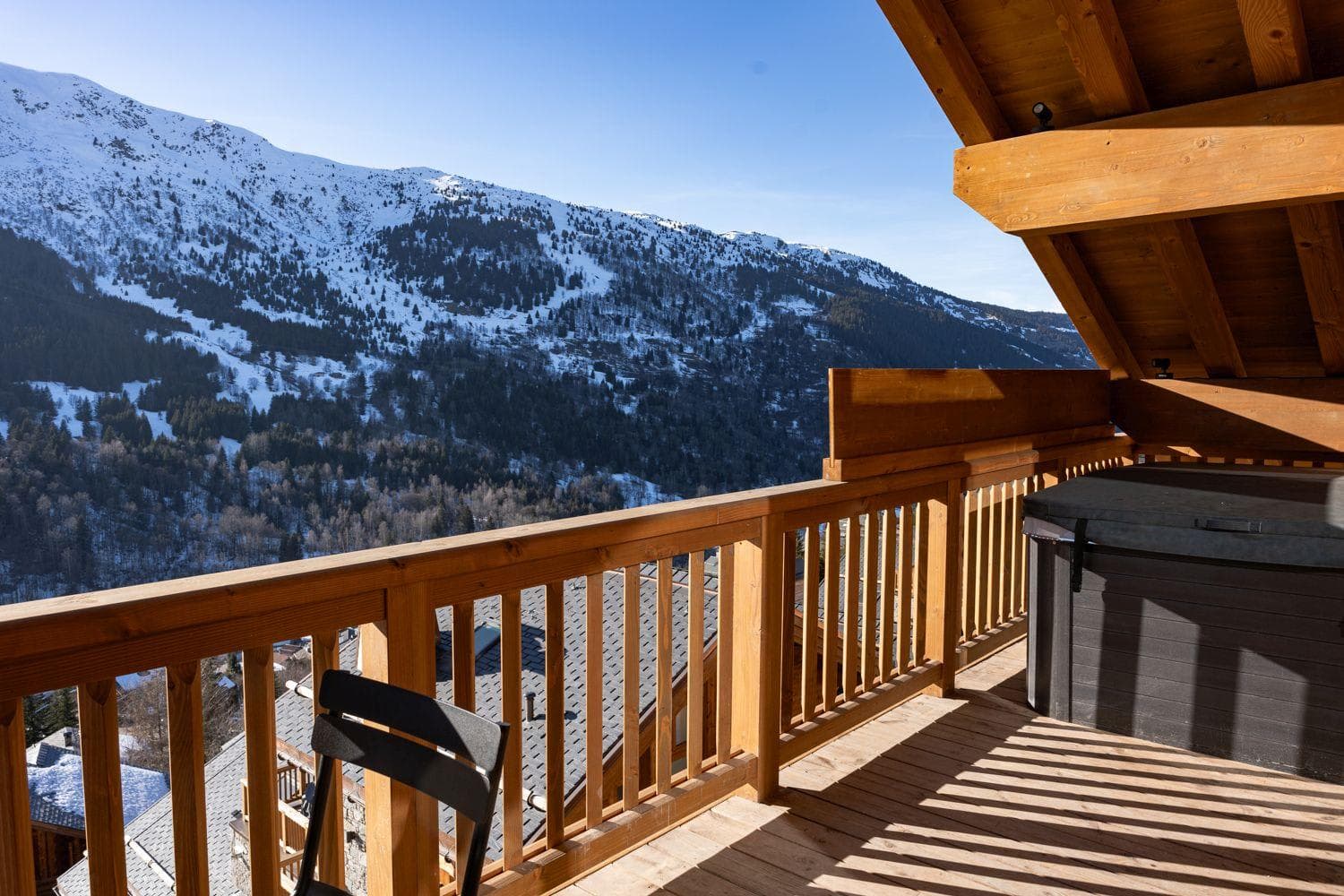 Private balcony with hot tub and alpine valley views