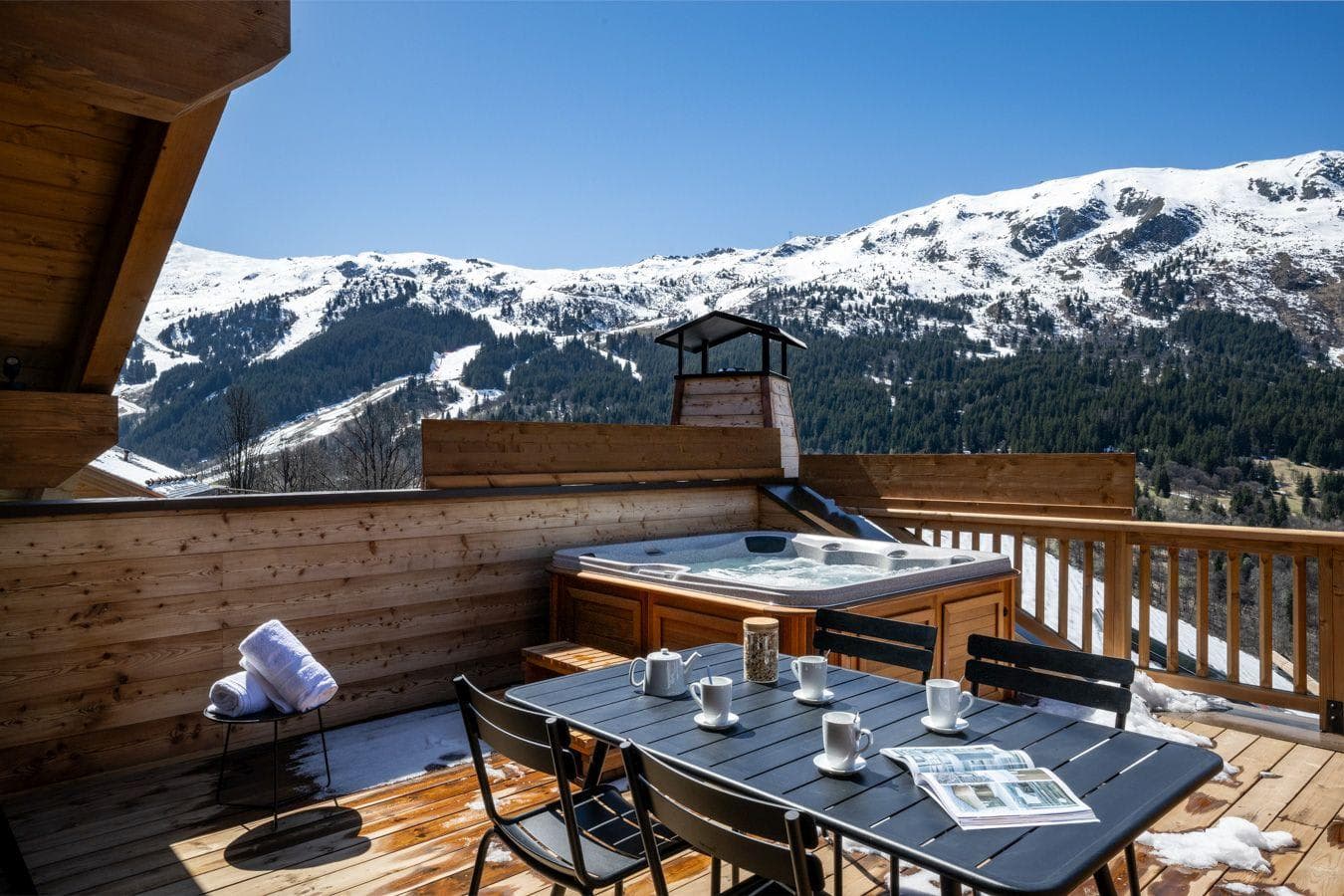 Deck with hot tub and dining for 4; ski slope views