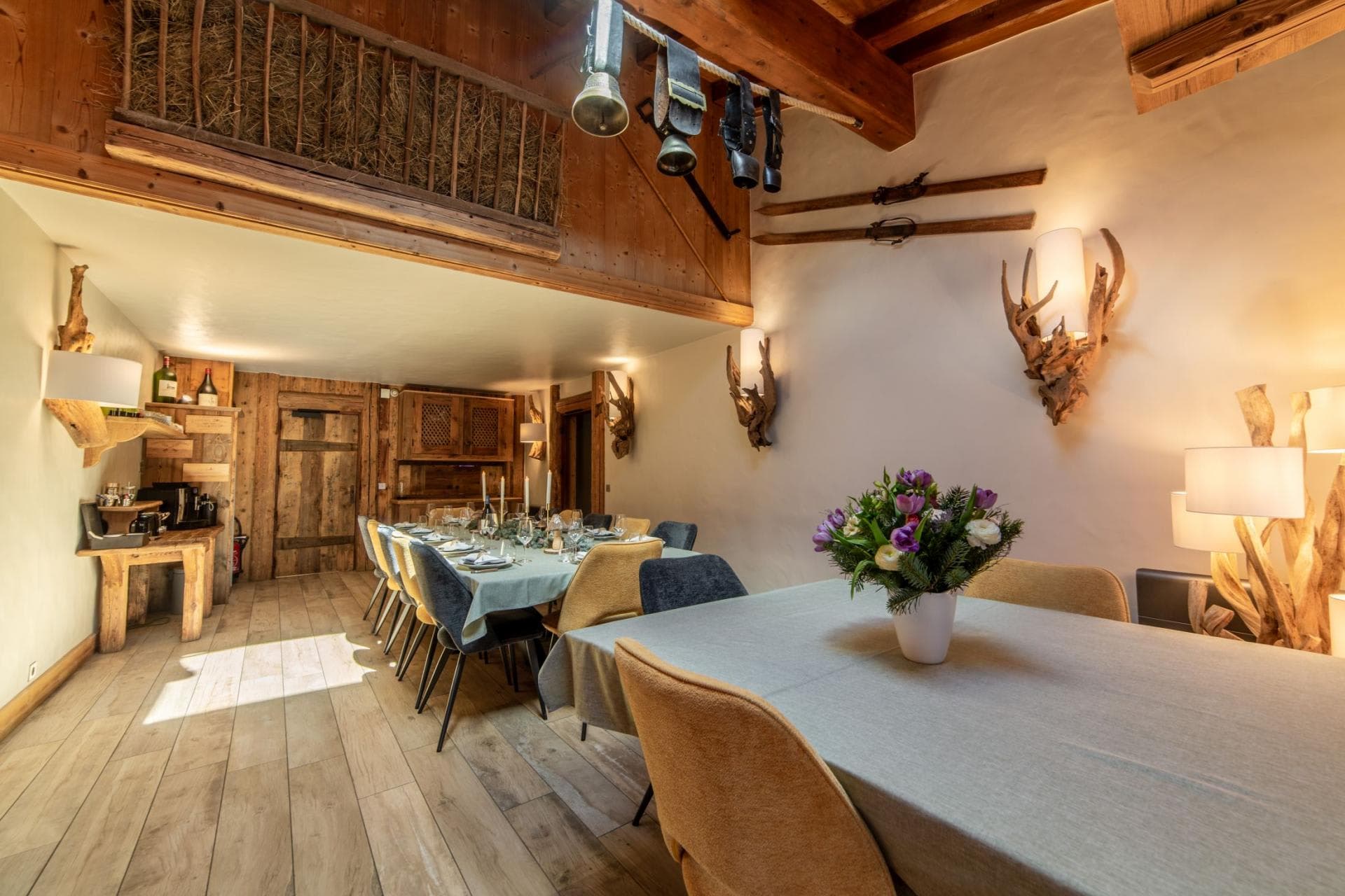 Dining area with seating for 14 and rustic timber accents