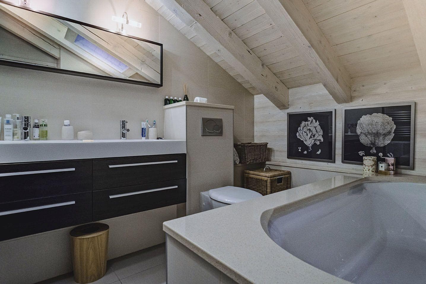 Bathroom with soaking tub and vaulted wood-beam ceilings
