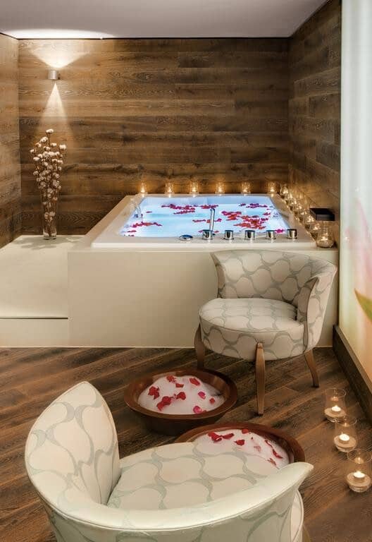 Spa bathroom with jetted soaking tub and separate foot baths