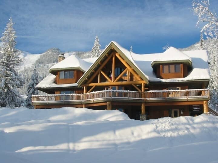 Log-style chalet with wrap-around deck and direct ski-in/ski-out access