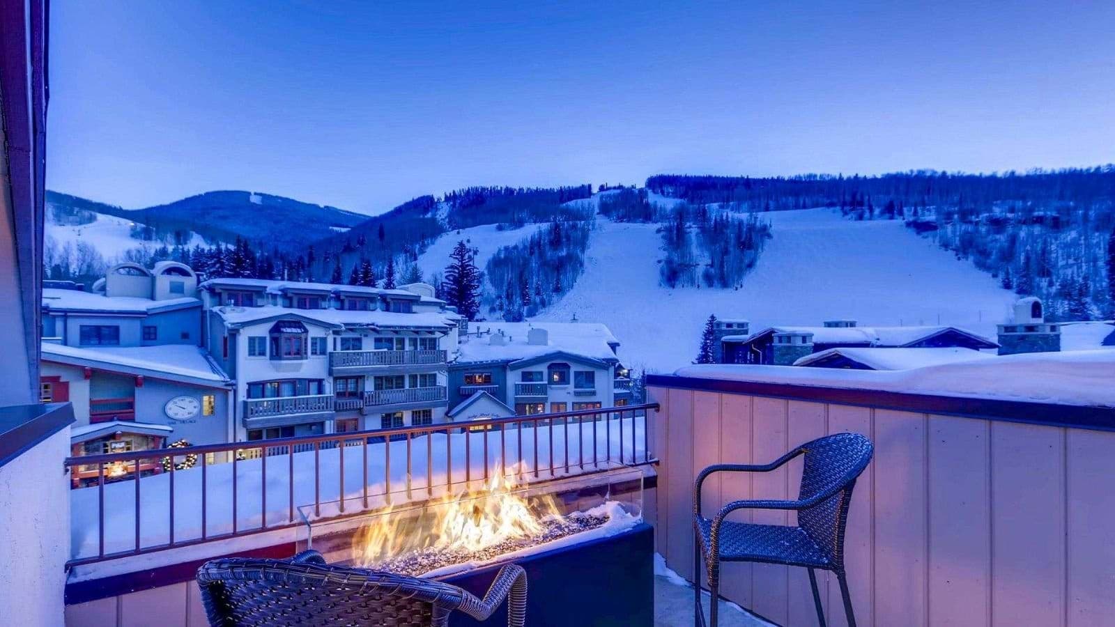 Private balcony with gas fire pit and ski-in/ski-out mountain views