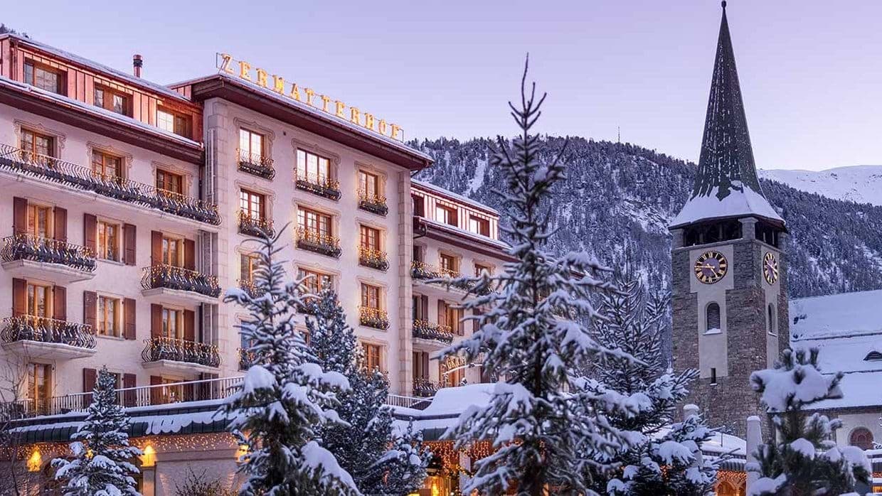 Hotel exterior adjacent to Zermatt village center and Pfarrkirche St. Mauritius