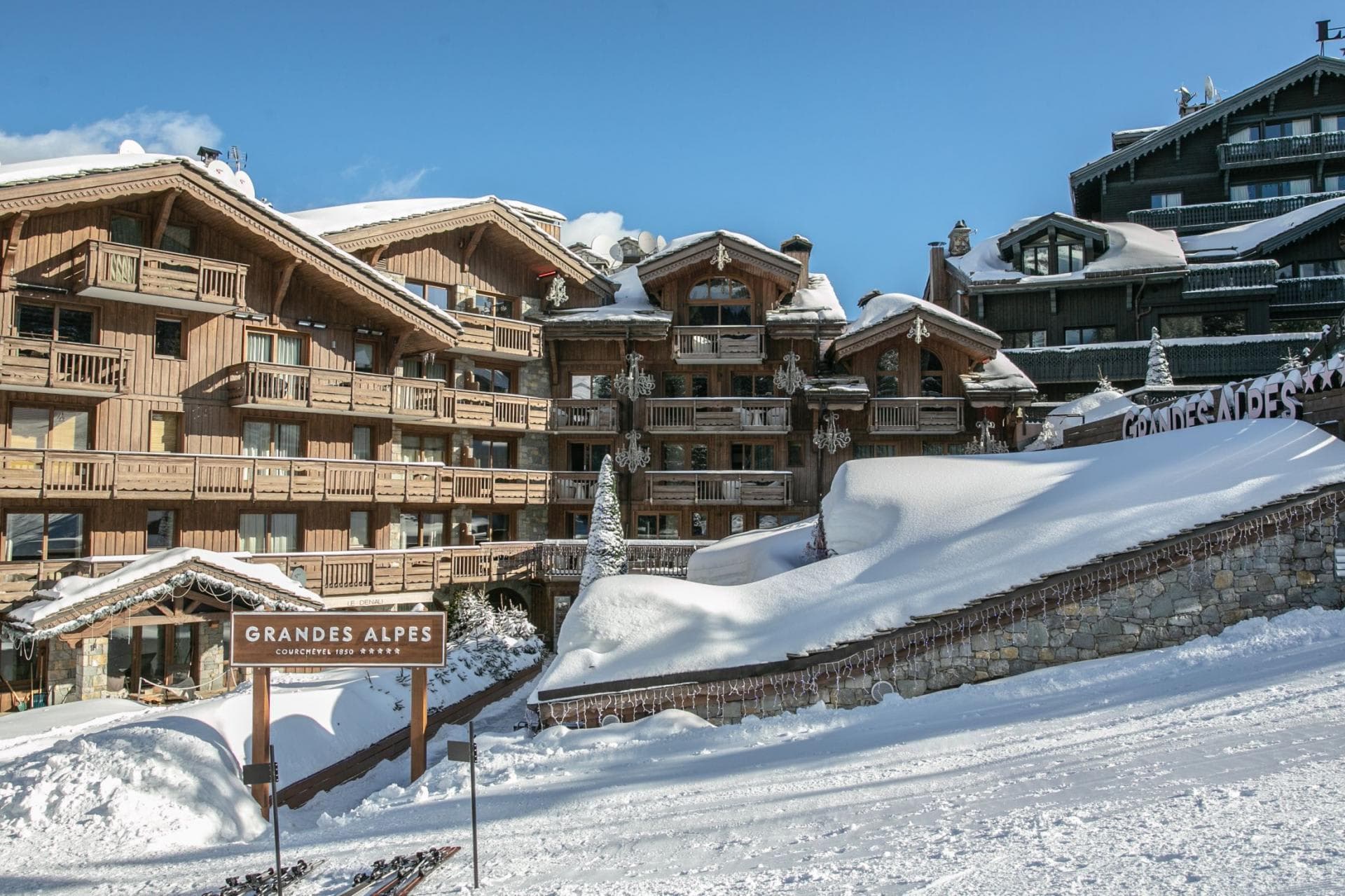 Ski-in/ski-out chalet exterior located directly on the Courchevel 1850 slopes