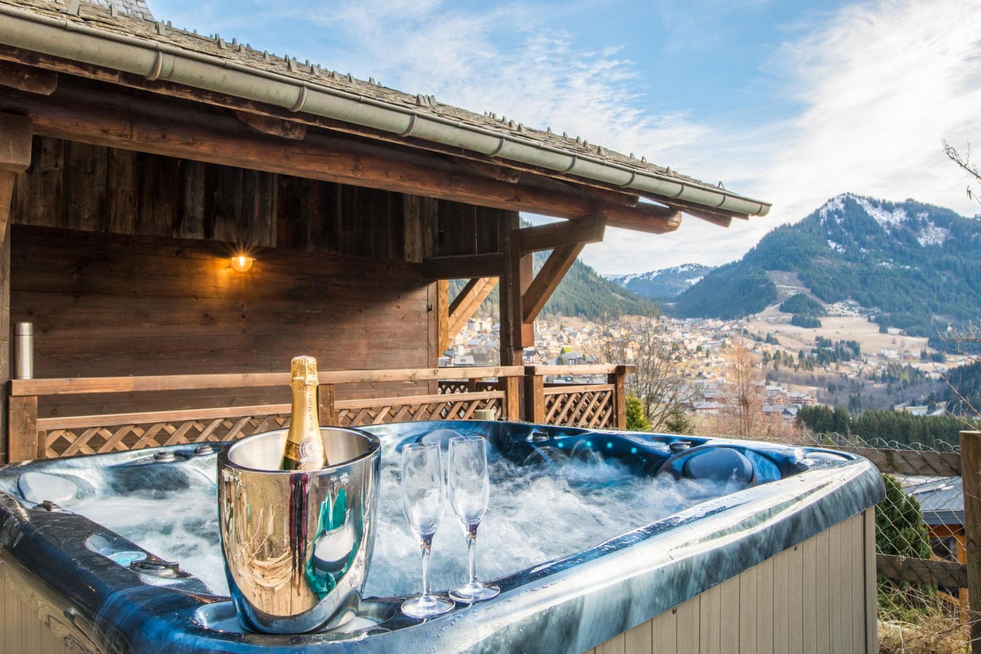 Outdoor hot tub overlooking Morzine village and the Pleney slopes