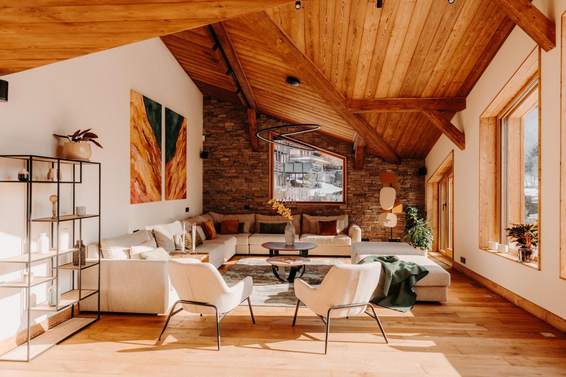 Living area with sectional seating for 10 and wood-beamed ceilings