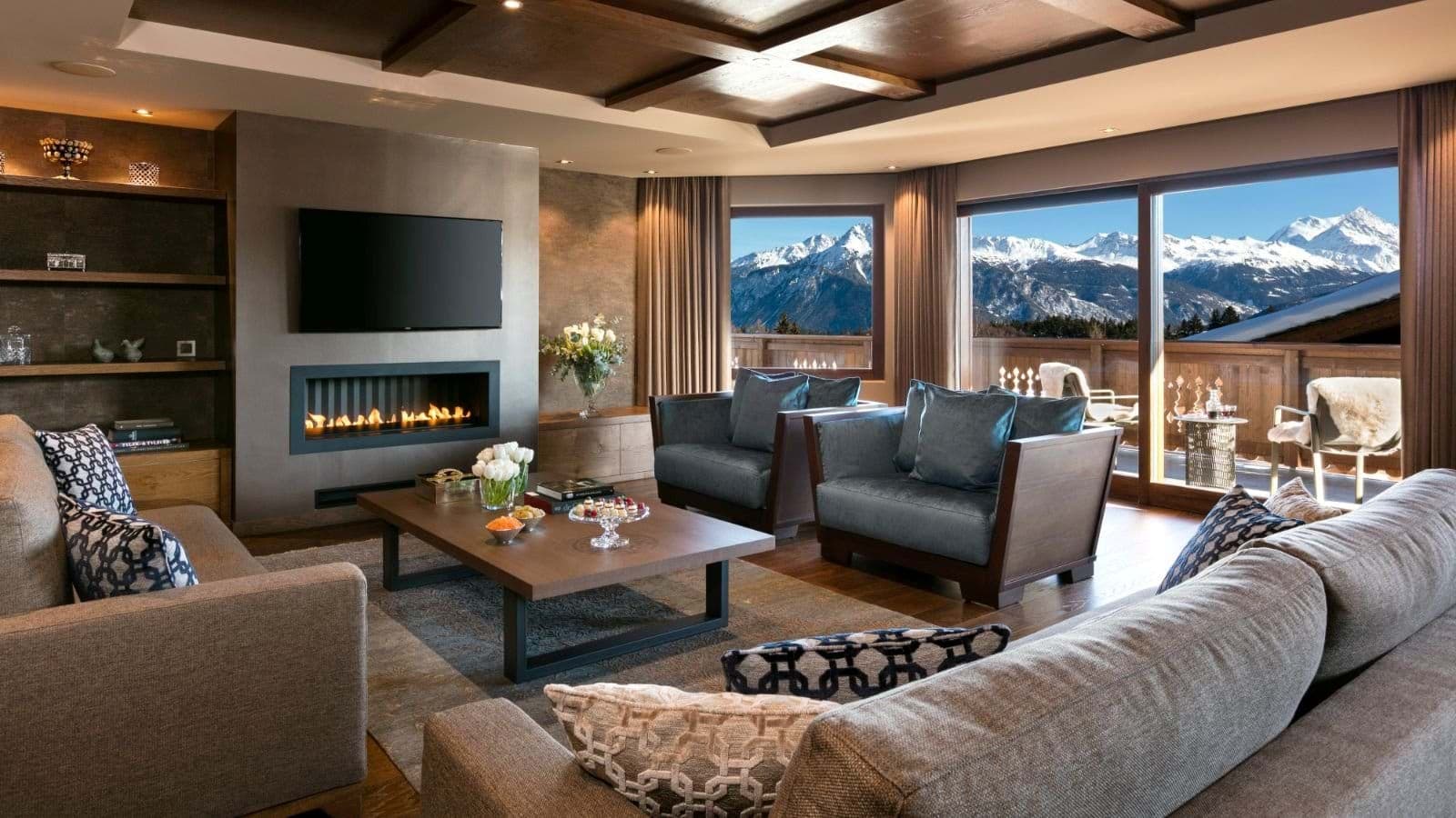 Living area with gas fireplace and panoramic mountain views