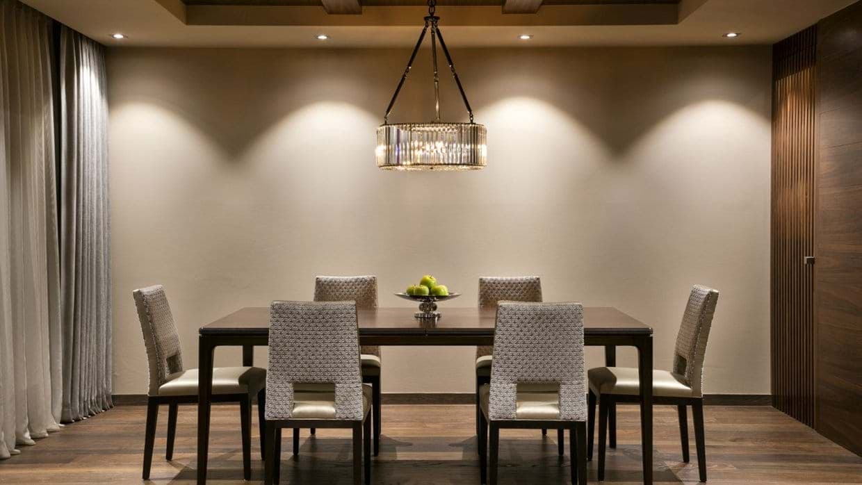 Dining table with seating for 6 and statement chandelier lighting