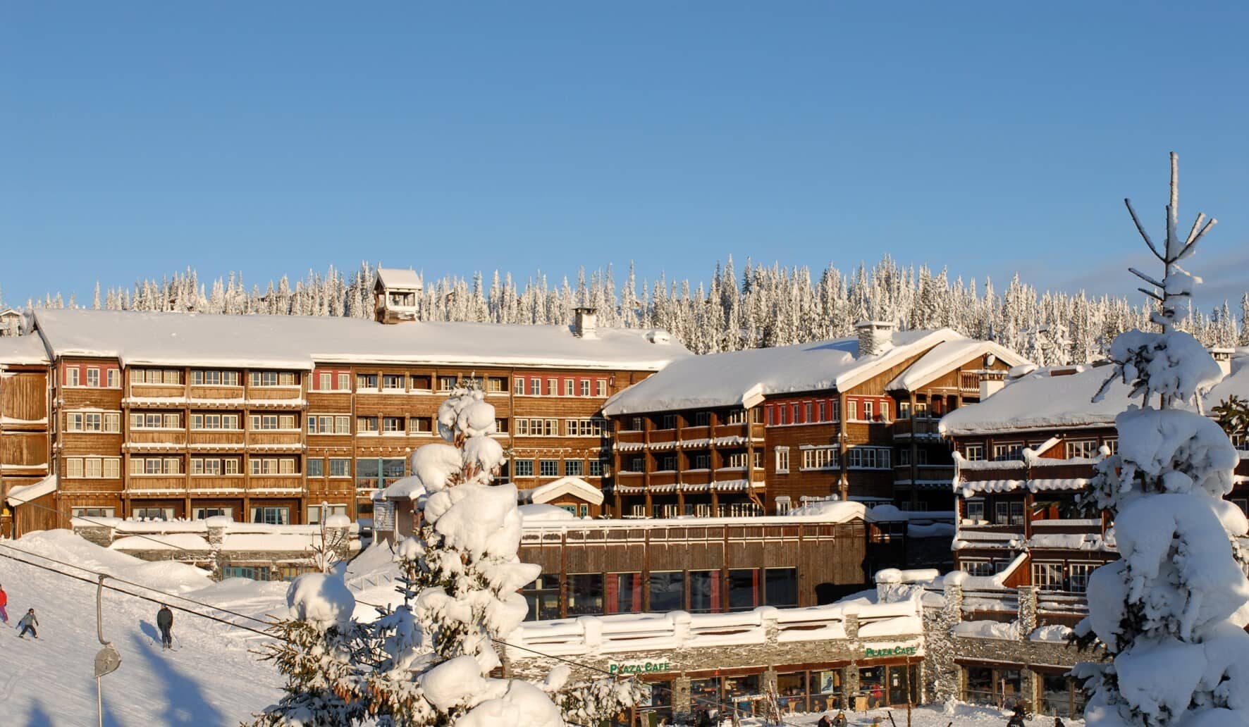 Ski-in, ski-out resort exterior with direct access to groomed slopes