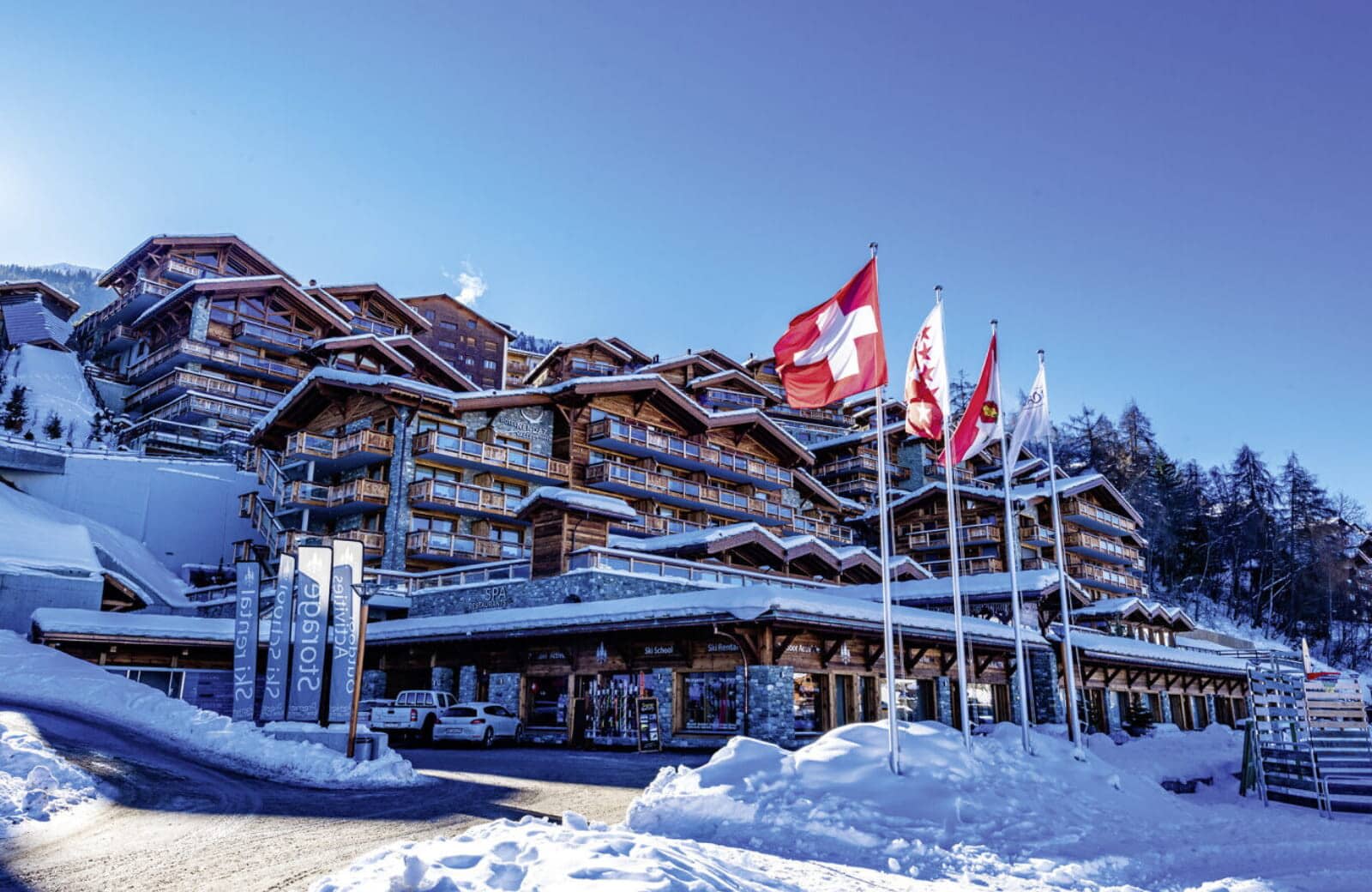 Ski-in/ski-out chalet exterior with on-site ski school and equipment rentals