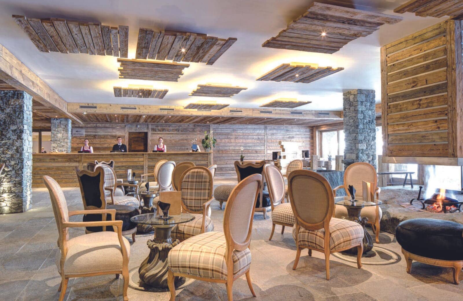 Lobby lounge with wood-burning fireplace and 24-hour reception desk