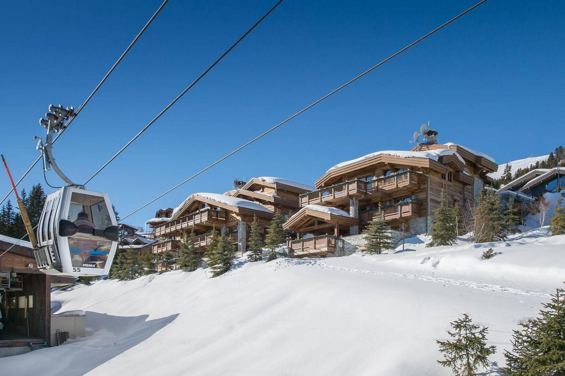 Ski-in, ski-out chalet located directly beside the Poma gondola line