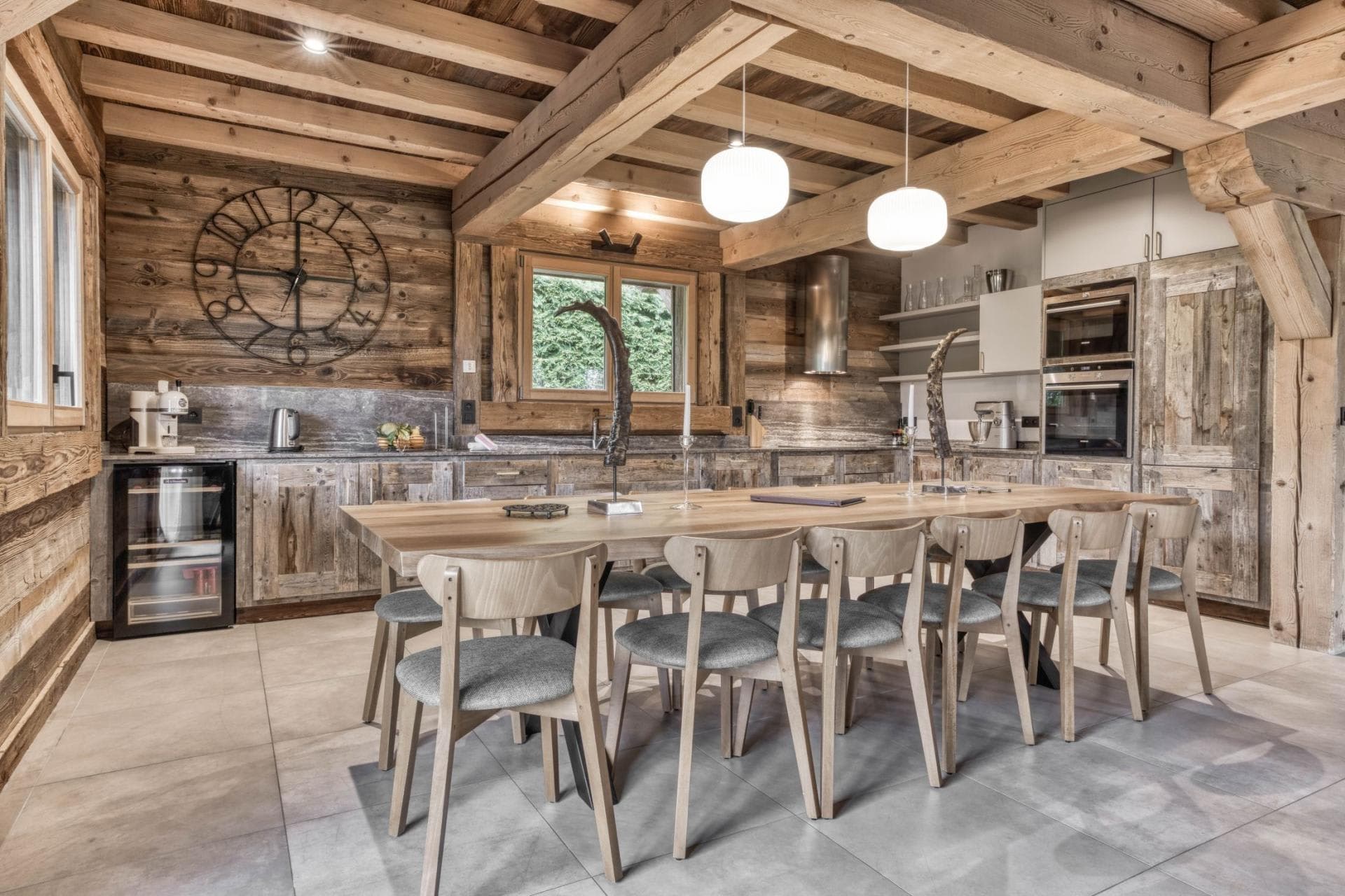 Kitchen and dining area with seating for 10 and wine fridge