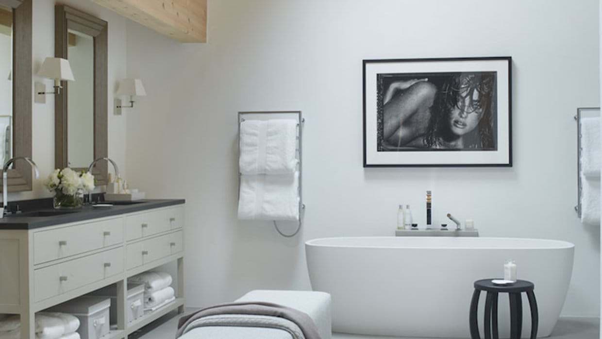 Bathroom with dual vanity and freestanding soaking tub