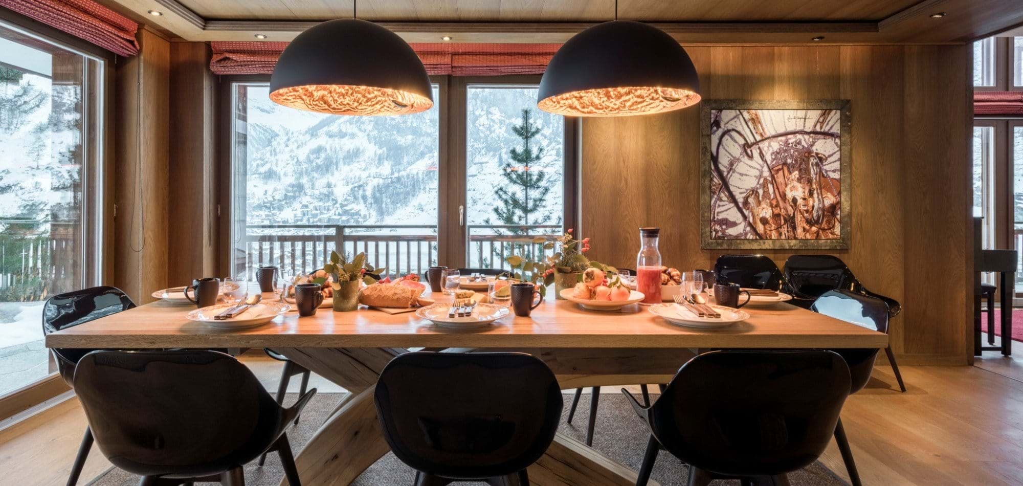 Dining table with seating for 10 and mountain valley views