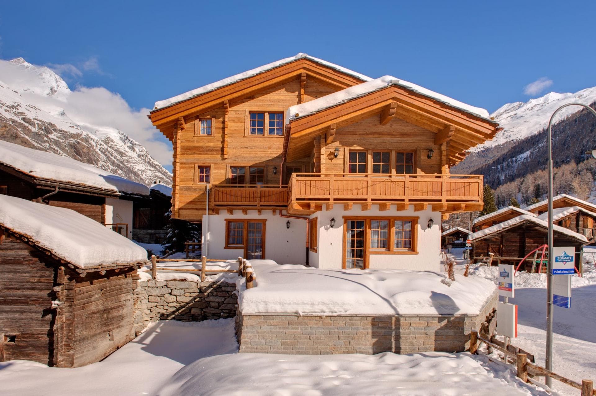 Timber chalet with private balconies and mountain views