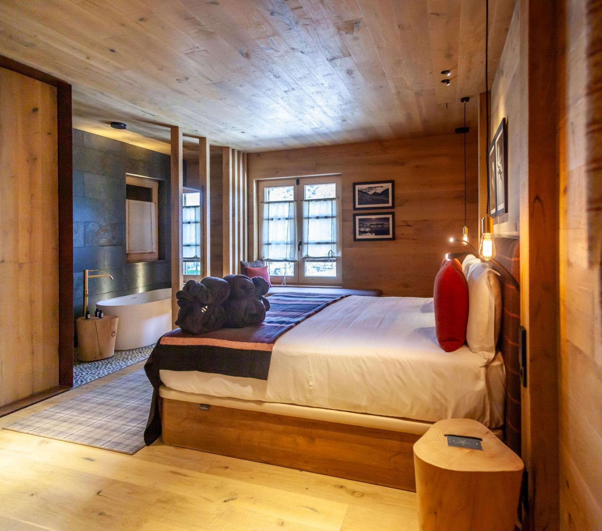 Primary bedroom with king bed and open-concept soaking tub