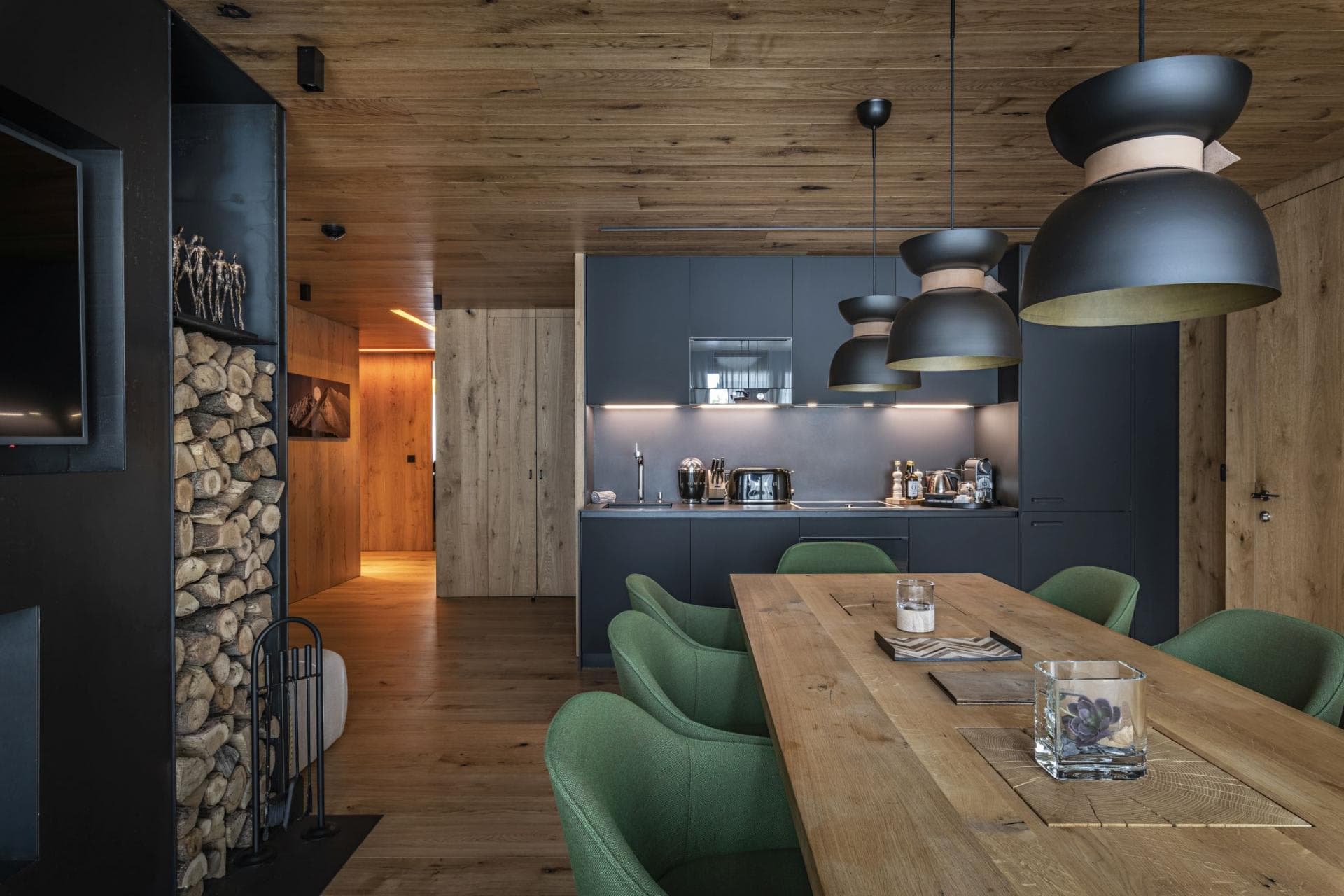 Open-plan dining area and kitchenette with seating for 8 guests