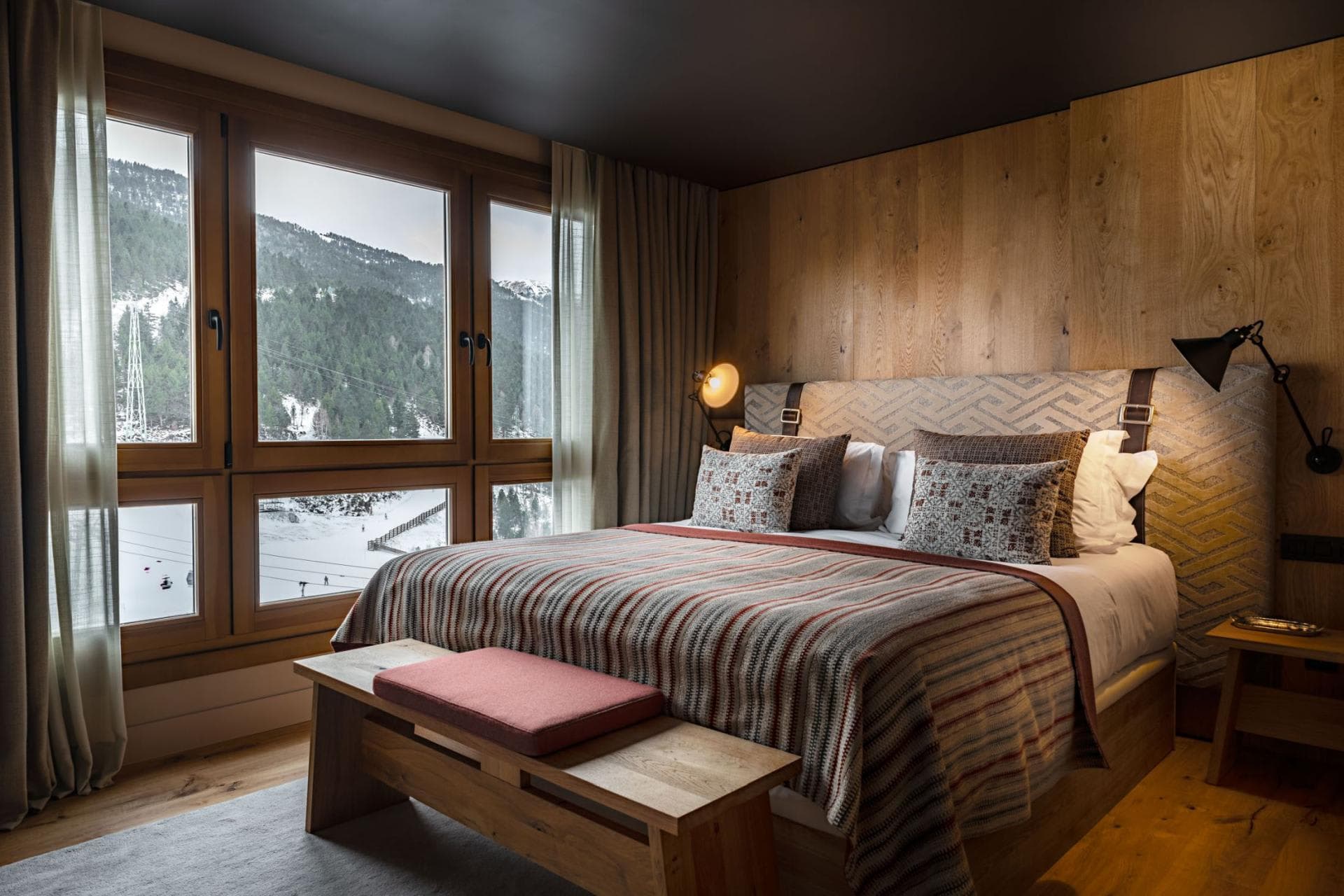 Guest bedroom with king bed and views of ski lifts
