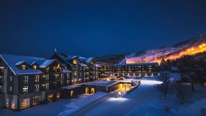 Resort exterior with direct view of illuminated night ski runs