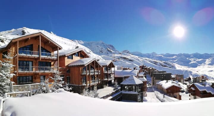 Ski-in, ski-out timber chalets with private balconies and mountain views