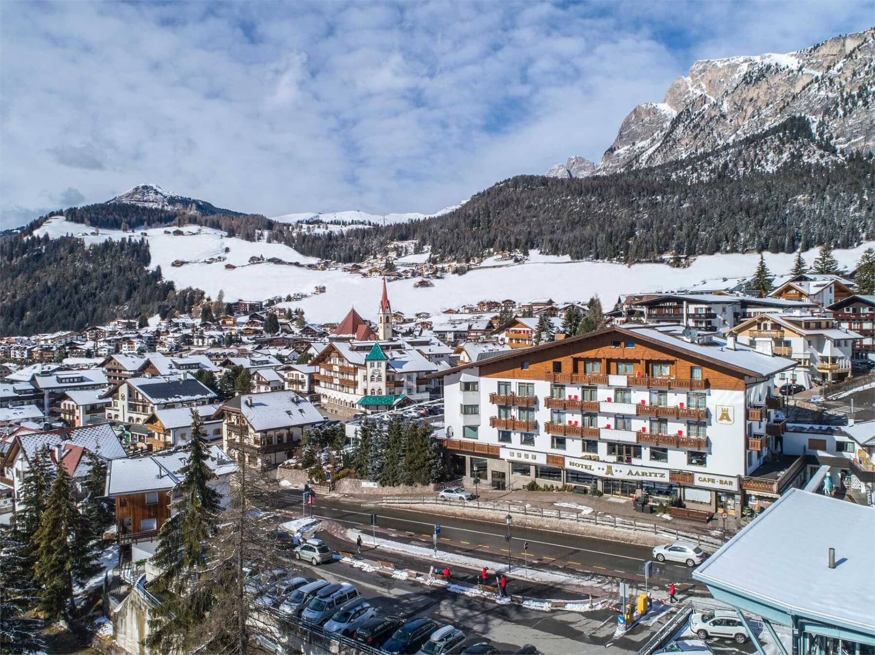 Aerial view of Selva di Val Gardena with direct access to Dolomites slopes