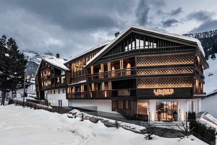 Chalet exterior with private balconies and mountain views