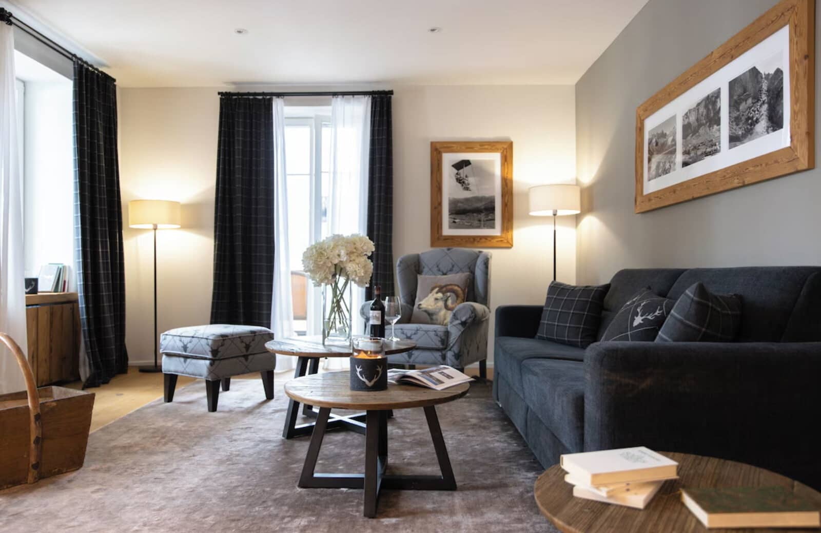 Living area with sofa seating and balcony access