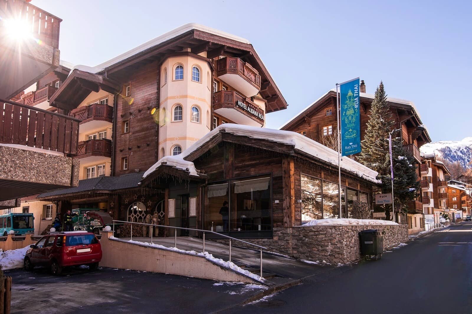 Hotel exterior with street-level entrance and on-site Thai restaurant