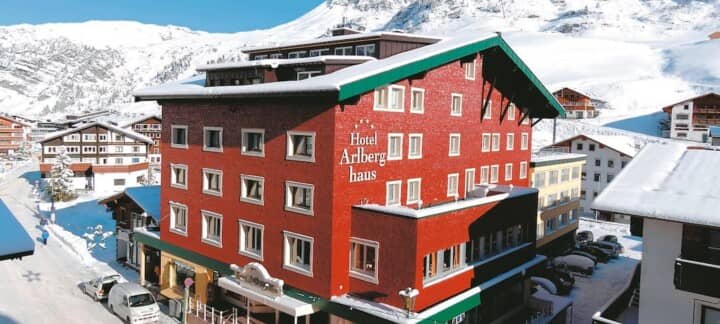 Ski-in, ski-out hotel exterior with immediate access to Arlberg slopes