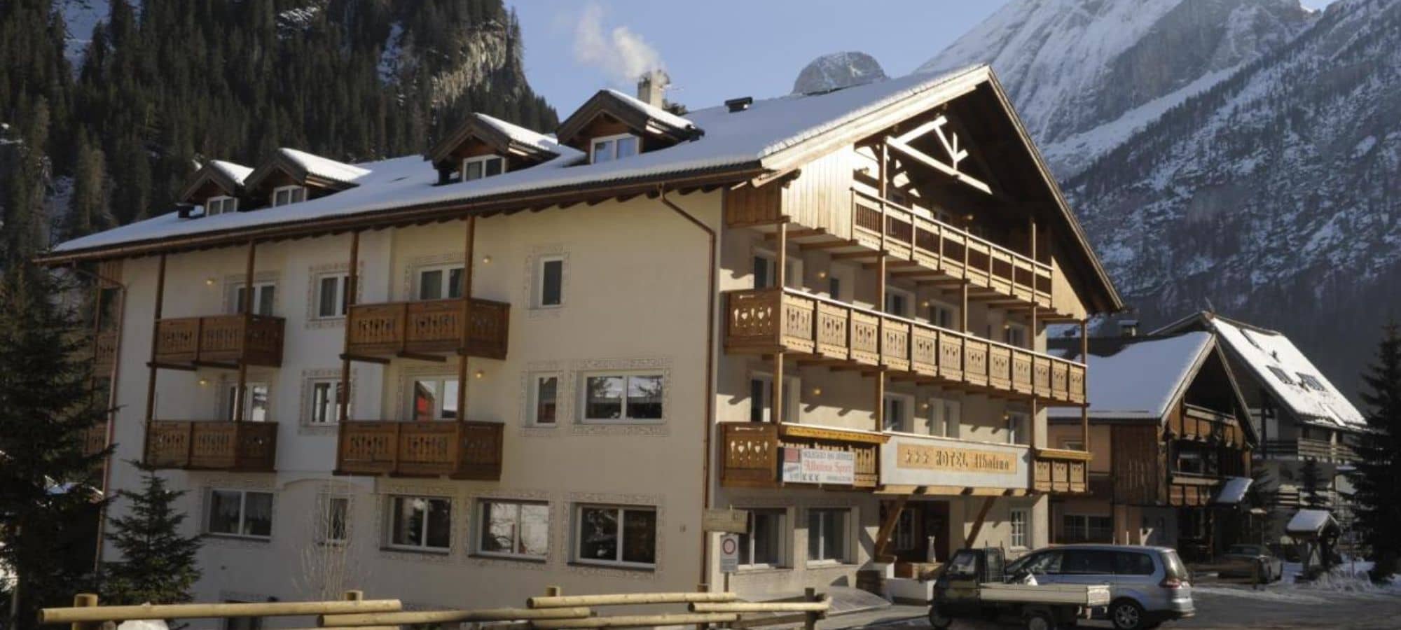 Chalet exterior with private balconies and mountain views