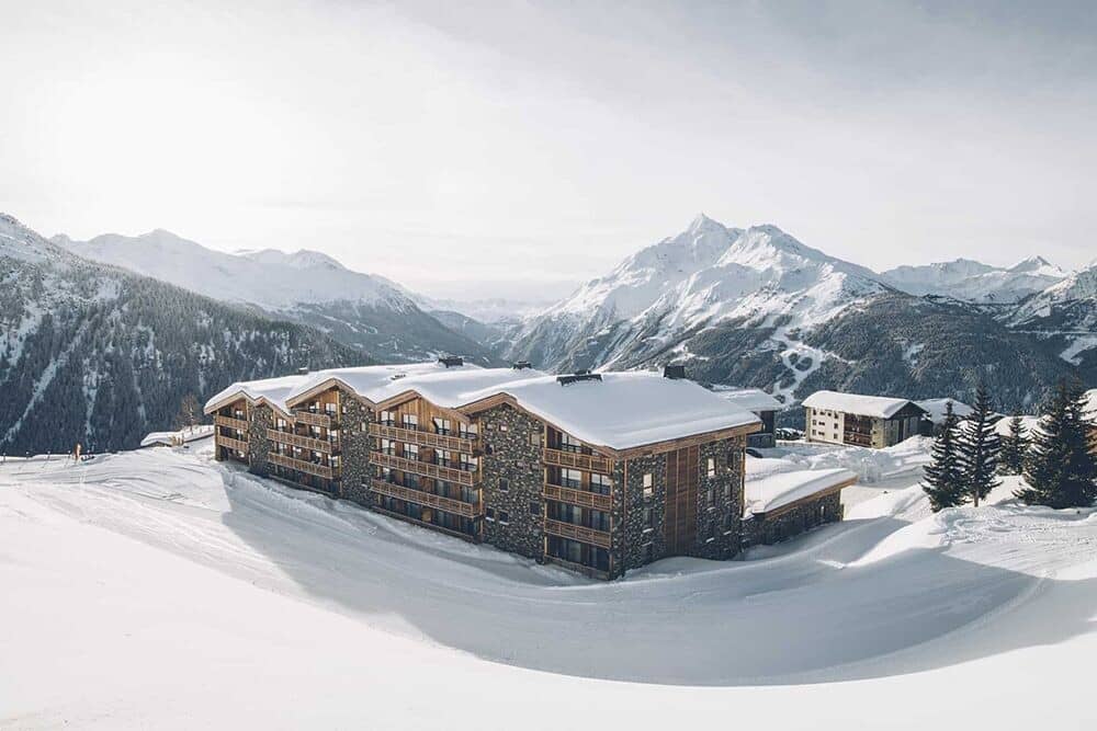 Ski-in, ski-out chalet exterior with private balconies and mountain views