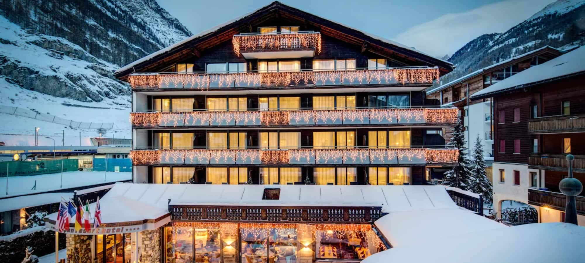 Chalet exterior with private balconies and mountain views near ski lift