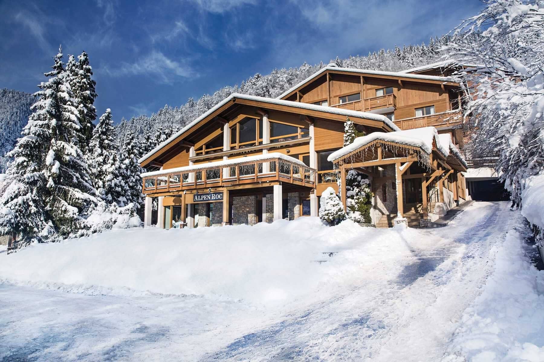 Chalet exterior with ski-in access and covered main entrance