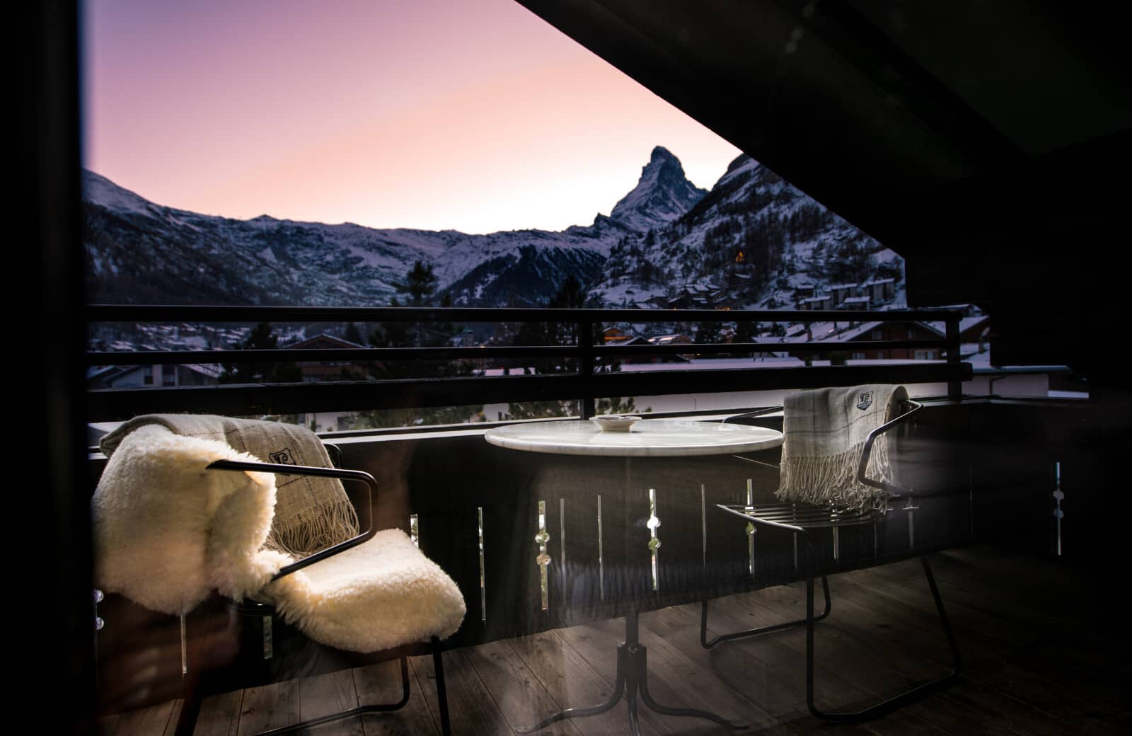 Private balcony with bistro seating and Matterhorn mountain views