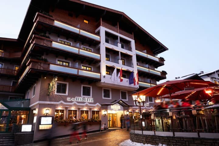 Hotel exterior featuring on-site restaurant and heated outdoor patio