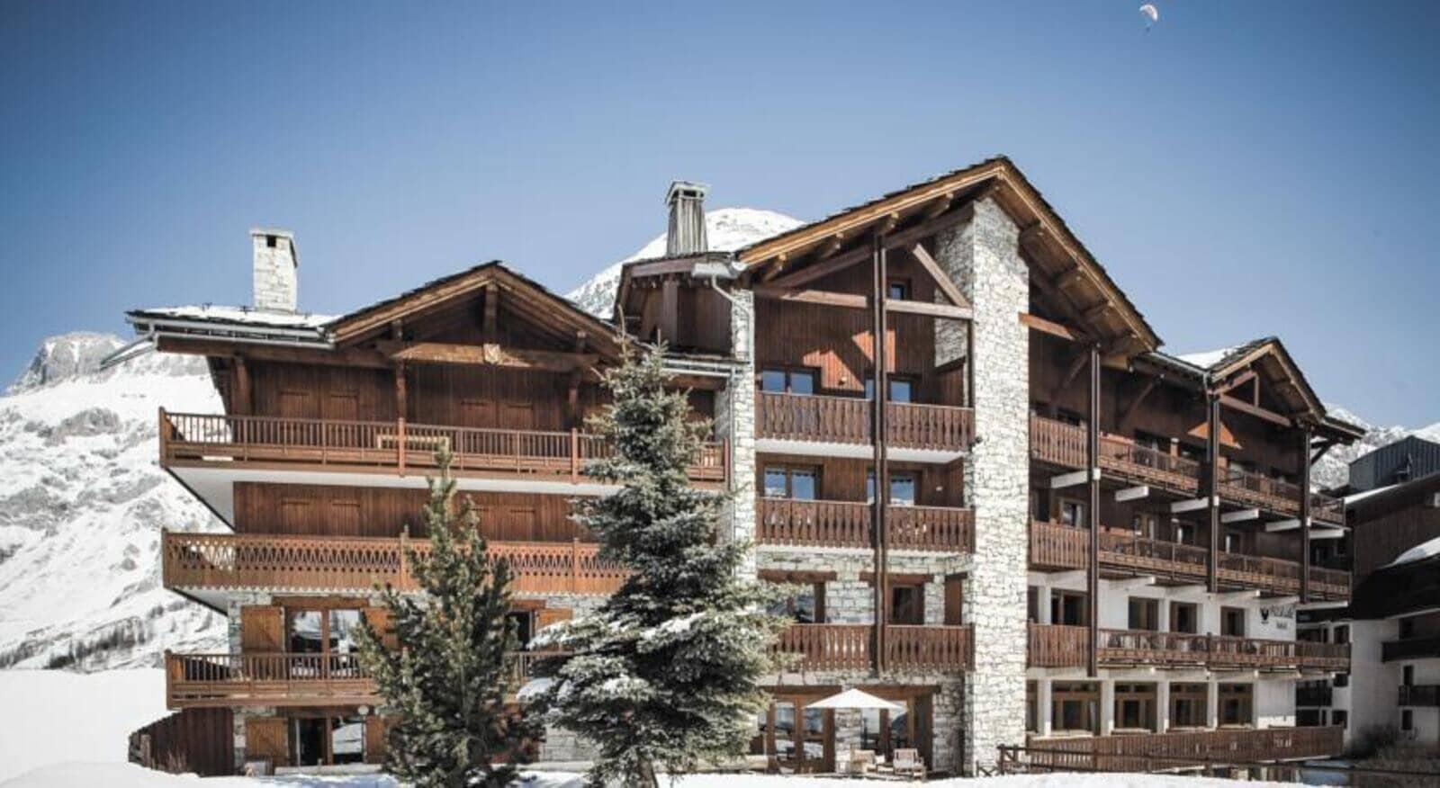 Ski-in, ski-out timber chalet with private balconies and mountain views