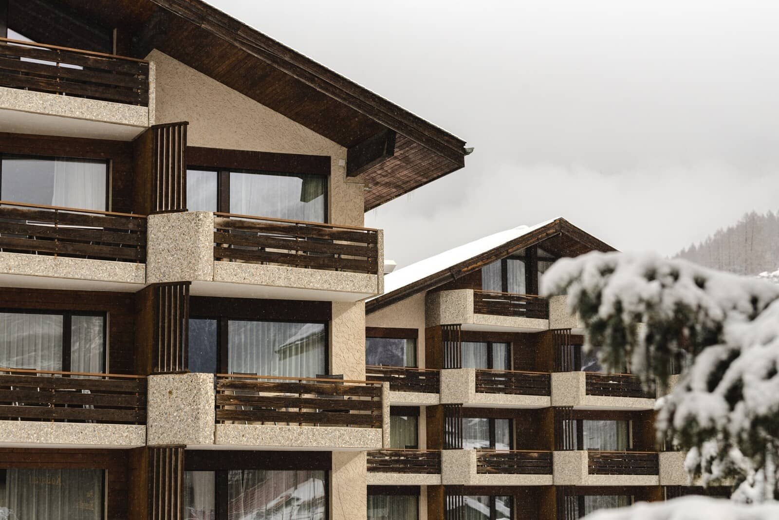 Ski chalet exterior featuring private balconies for every guest suite